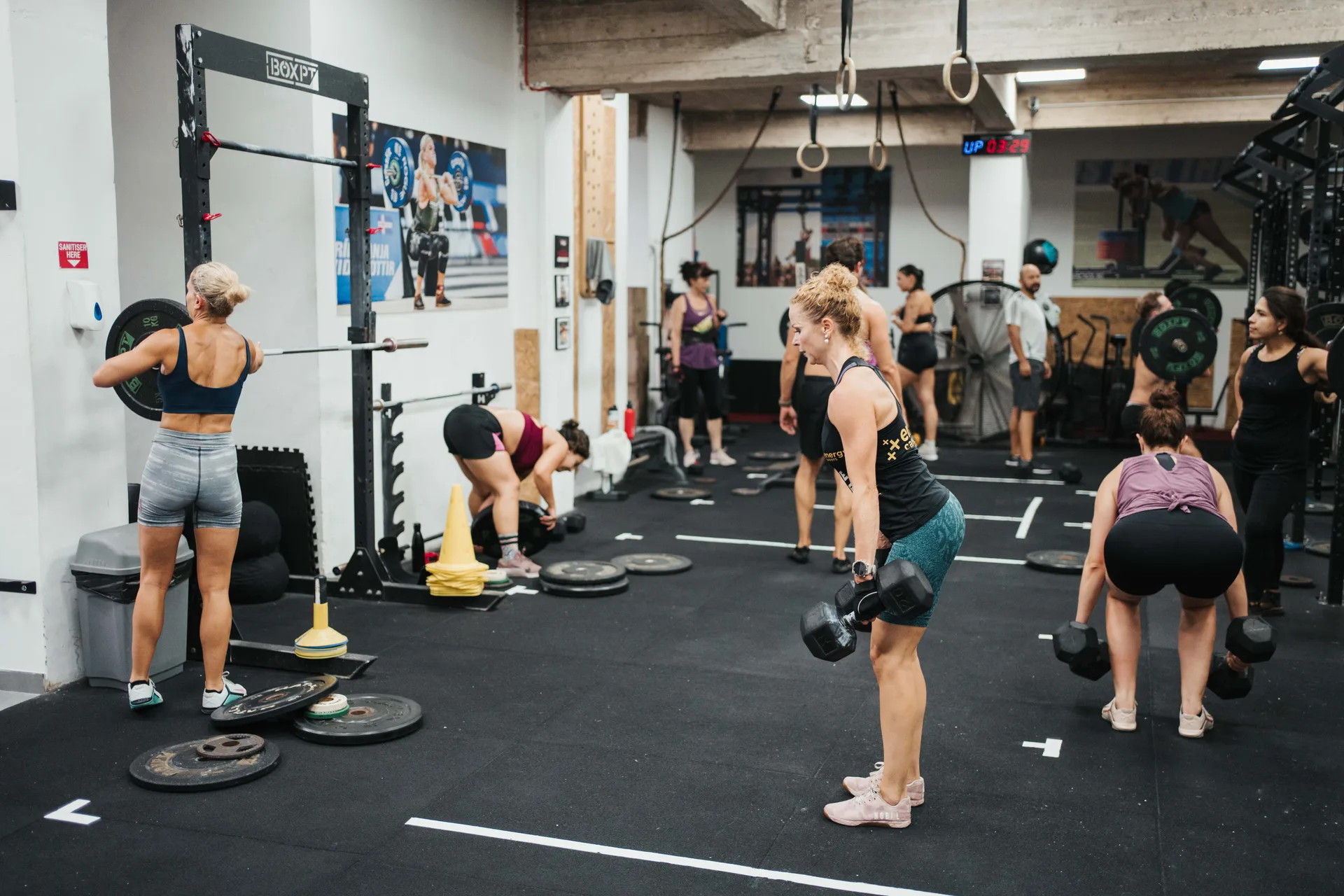 Group class training with barbells and dumbbells at F15 Training CENTR gym Malta